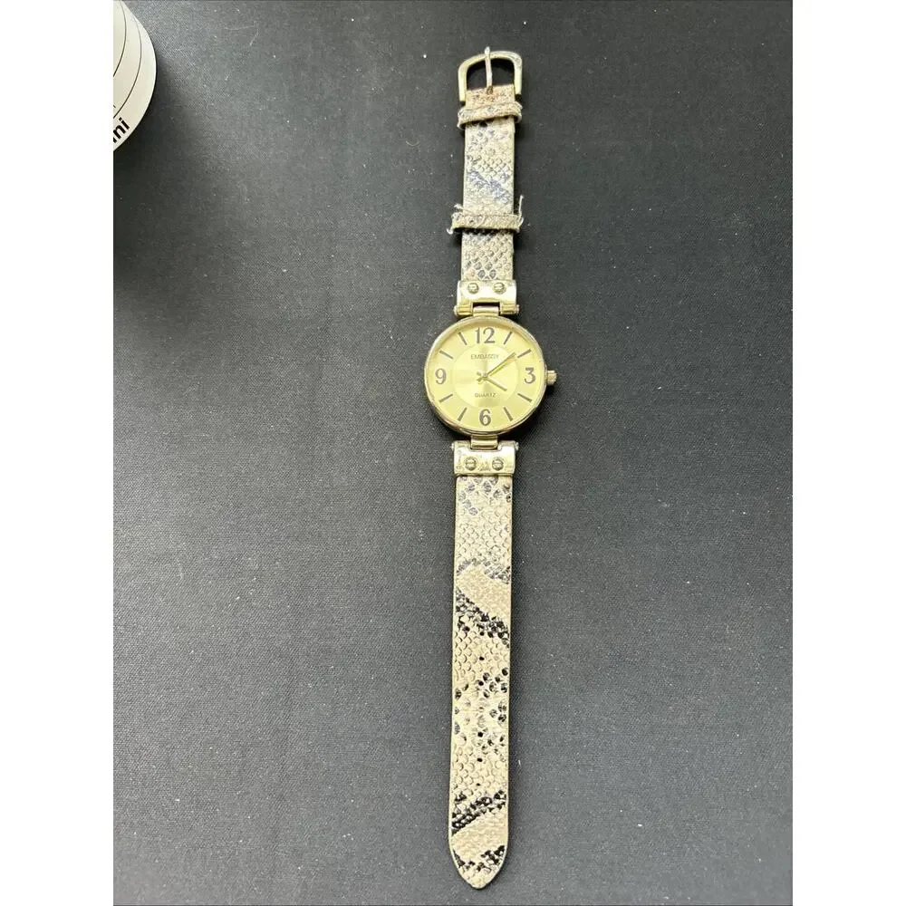 Embassy Gold Tone Snakeskin Type Band Women’s Quartz Watch